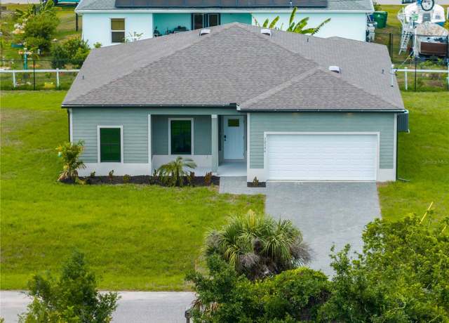 Property at 12156 Wellington Ave, Port Charlotte, FL 33981, 4 beds, 2 baths