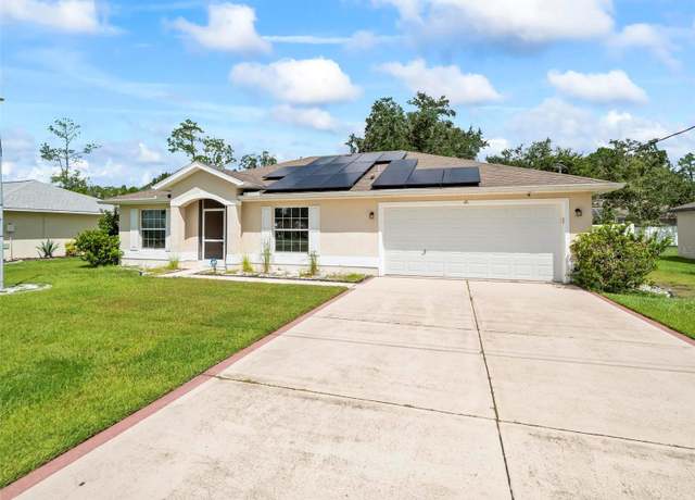 Property at 61 Zinnia Trl, Palm Coast, FL 32164, 4 beds, 2 baths