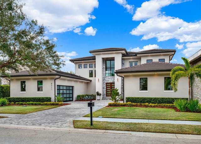 Property at 8521 Lake Nona Shore Dr, Orlando, FL 32827, 5 beds, 6 baths
