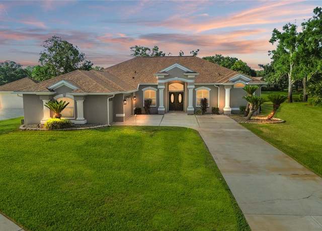 Property at 1313 Oxbridge Dr, Lutz, FL 33549, 4 beds, 3.5 baths