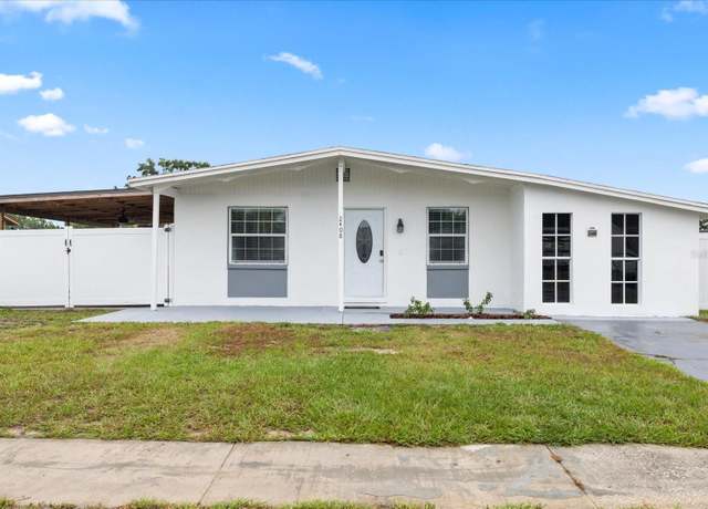 Property at 2408 Wishing Well Way, Tampa, FL 33619, 4 beds, 2 baths