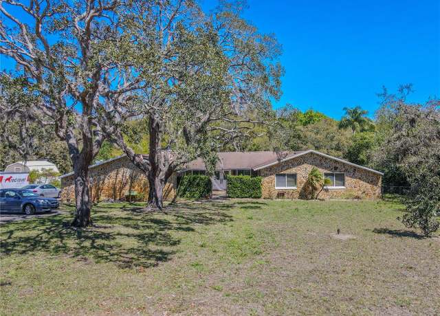 Property at 10100 Grove Dr, Port Richey, FL 34668, 4 beds, 3 baths