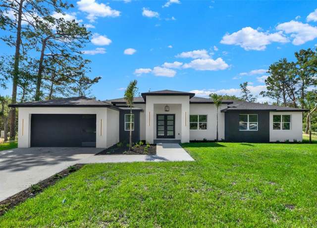 Property at 42191 Cashew St, Eustis, FL 32736, 4 beds, 2.5 baths