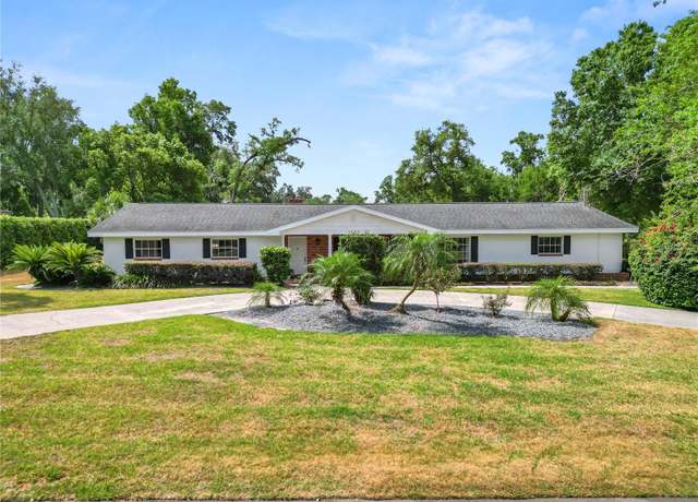 Property at 1205 Rolling Woods Ln, Lakeland, FL 33813, 5 beds, 3.5 baths