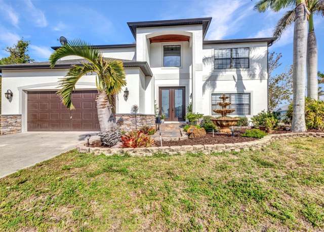 Property at 9239 Impala Cir, Port Charlotte, FL 33981, 4 beds, 2.5 baths