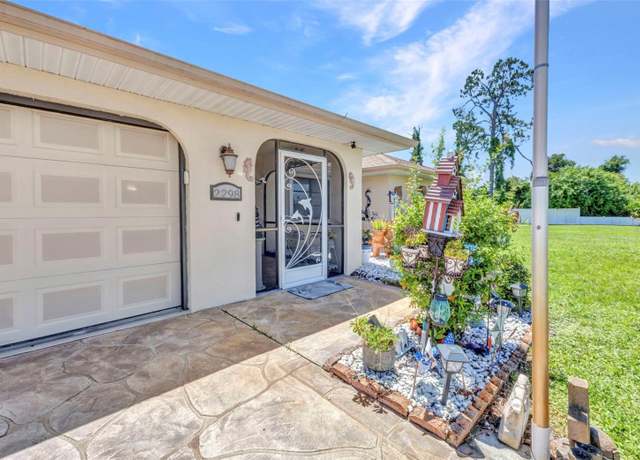 Property at 2298 Cedarwood St, Port Charlotte, FL 33948, 3 beds, 2 baths