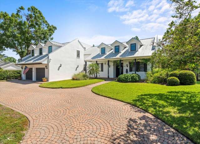 Property at 13801 Lake Village Pl, Tampa, FL 33618, 5 beds, 4.5 baths