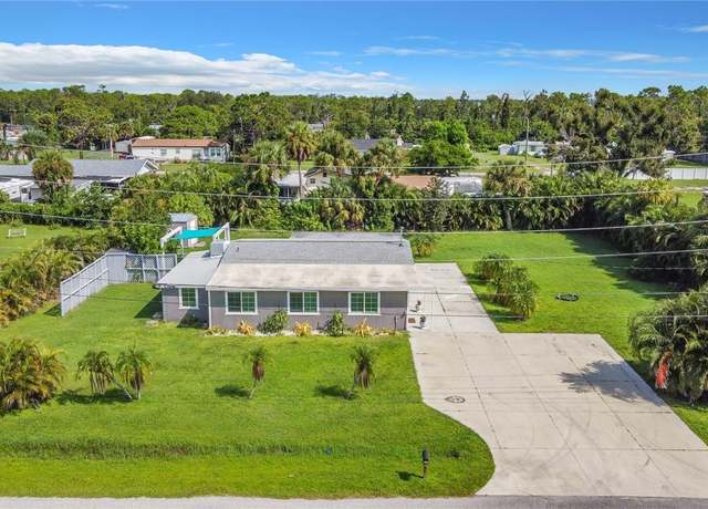 Property at 8430 Truman St, Englewood, FL 34224, 4 beds, 2 baths
