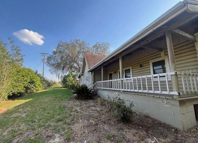 Property at 1920 E Palm St, Davenport, FL 33837, 4 beds, 2.5 baths
