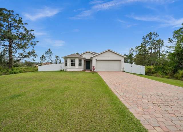 Property at 491 Woodman Dr, Lehigh Acres, FL 33972, 3 beds, 2 baths