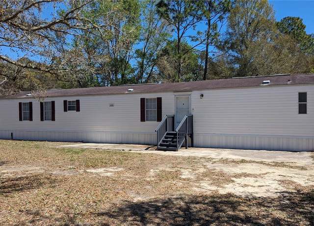 Property at 11091 NE 101 Ct, Archer, FL 32618, 3 beds, 2 baths