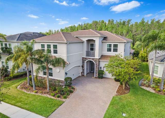 Property at 30900 Spruceberry Ct, Wesley Chapel, FL 33543, 4 beds, 4 baths