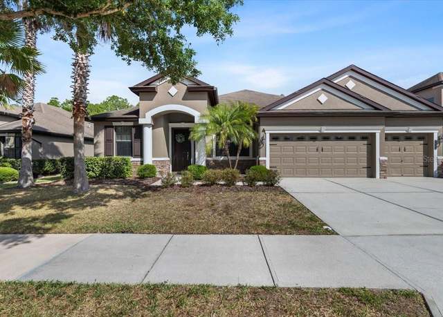 Property at 7911 Hampton Lake Dr, Tampa, FL 33647, 4 beds, 4 baths