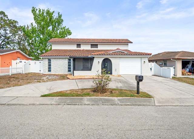 Property at 9100 Suffolk Ln, Port Richey, FL 34668, 4 beds, 3 baths