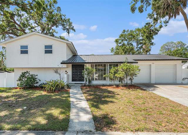 Property at 8302 W Pocahontas Ave, Tampa, FL 33615, 4 beds, 3 baths
