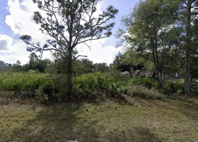 Property at 911 Magnolia Dr, Indian Lake Estates, FL 33855