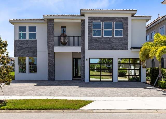 Property at 300 Muirfield Loop, Reunion, FL 34747, 6 beds, 10.5 baths