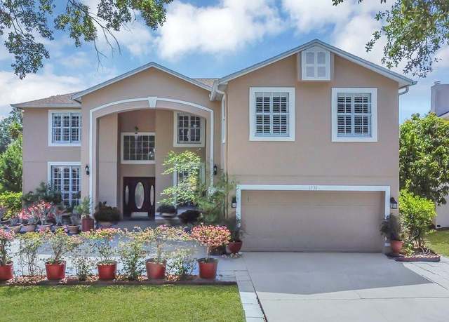 Property at 1731 Knotting Hill Dr, Orlando, FL 32835, 5 beds, 3 baths