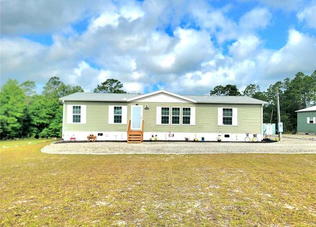 Property at 7030 SE 120th Ct, Morriston, FL 32668, 3 beds, 2 baths