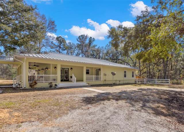 Property at 19256 Hidden Oaks Dr, Brooksville, FL 34604, 5 beds, 4.5 baths