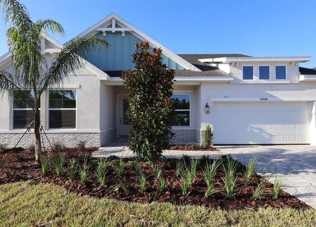 Property at 31486 Hayman Loop, Wesley Chapel, FL 33545, 4 beds, 3 baths