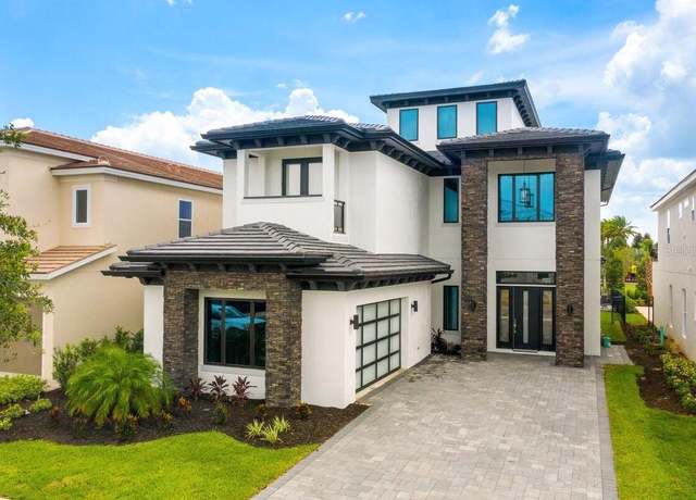 Property at 1015 Jack Nicklaus Ct, Kissimmee, FL 34747, 8 beds, 9 baths