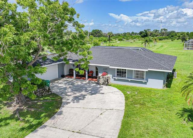 Property at 2305 Beacon Dr, Port Charlotte, FL 33952, 3 beds, 2 baths