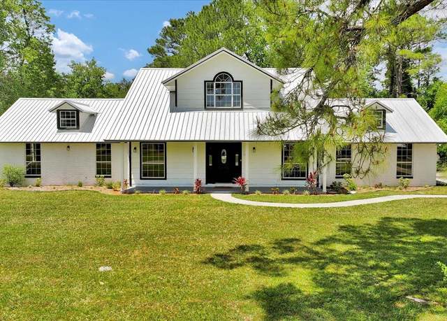 Property at 100 Redbud Woods Trl, Palatka, FL 32177, 4 beds, 3.5 baths