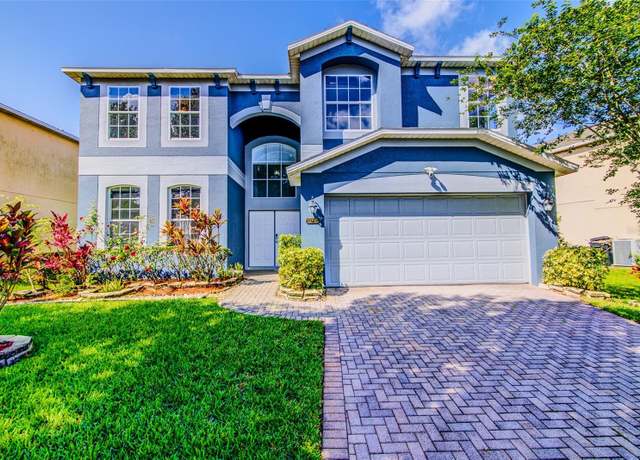 Property at 12715 Moss Park Ridge Dr, Orlando, FL 32832, 5 beds, 3 baths