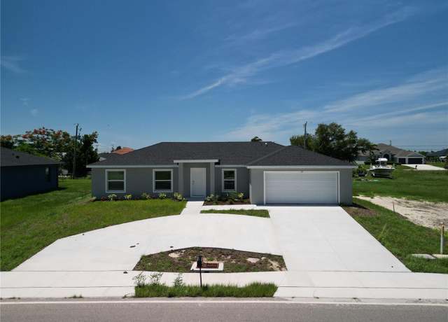 Property at 22 Tropicana Pkwy W, Cape Coral, FL 33993, 4 beds, 2 baths