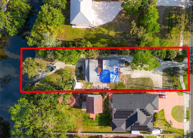 Property at 8615 Jackson Springs Rd, Tampa, FL 33615, 5 beds, 2 baths