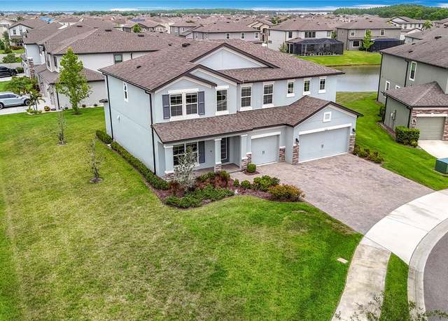 Property at 7628 Surf Reed Way, Wesley Chapel, FL 33545, 5 beds, 3 baths