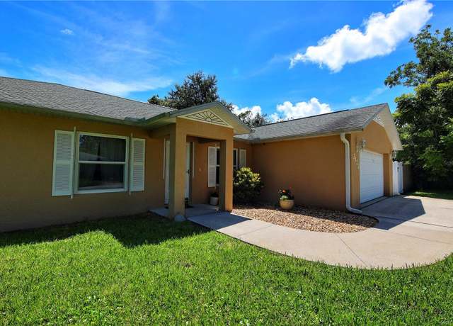 Property at 3123 Woodland Dr, Edgewater, FL 32141, 4 beds, 2 baths