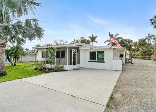 Property at 23475 Harper Ave, Port Charlotte, FL 33980, 4 beds, 2 baths