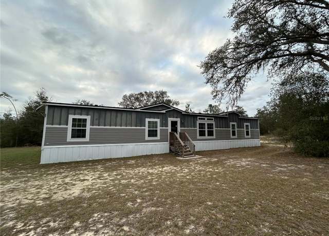 Property at 10451 NE 92nd Pl, Bronson, FL 32621, 4 beds, 2 baths