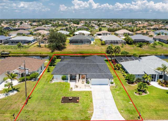Property at 209 Fairway Rd, Rotonda West, FL 33947, 3 beds, 2 baths