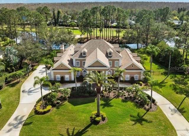 Property at 4110 Highland Park Cir, Lutz, FL 33558, 5 beds, 5.5 baths