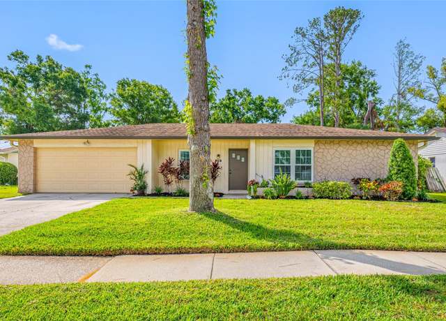 Property at 4220 Woodlark Dr, Tampa, FL 33624, 4 beds, 2 baths