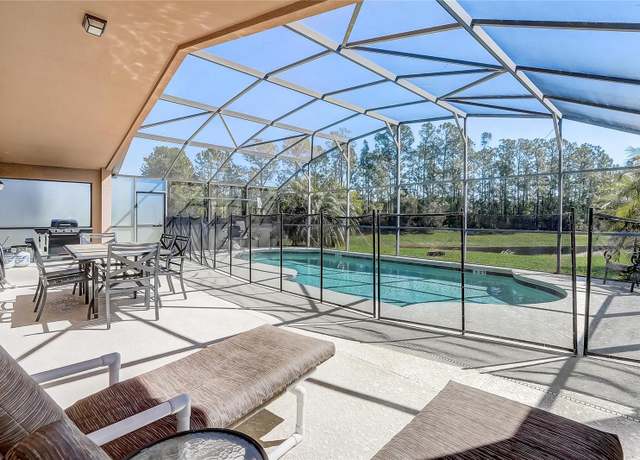 Property at 927 Orange Cosmos Blvd, Davenport, FL 33837, 4 beds, 3 baths