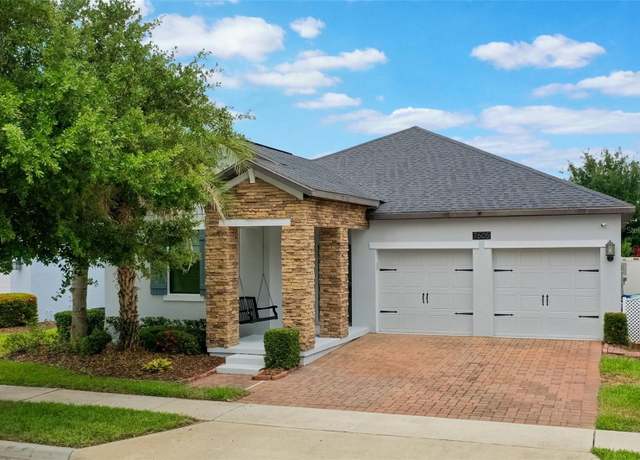 Property at 7605 Lake Hancock Blvd, Winter Garden, FL 34787, 4 beds, 3 baths