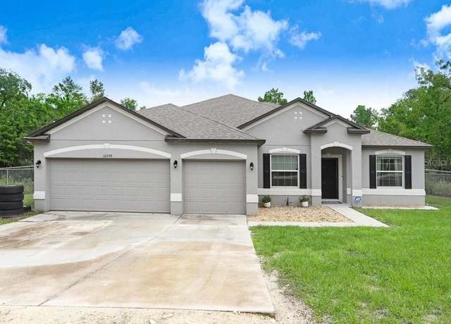 Property at 12290 Quigley Ave, Brooksville, FL 34614, 4 beds, 3 baths