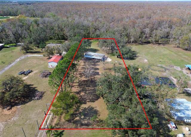 Property at 12001 Dozer Ln, Thonotosassa, FL 33592, 4 beds, 2 baths