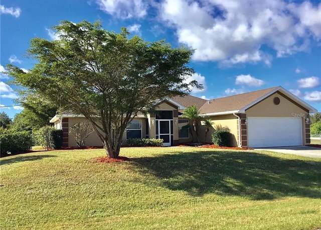 Property at 2409 Crawford Ave N, Lehigh Acres, FL 33971, 3 beds, 2 baths