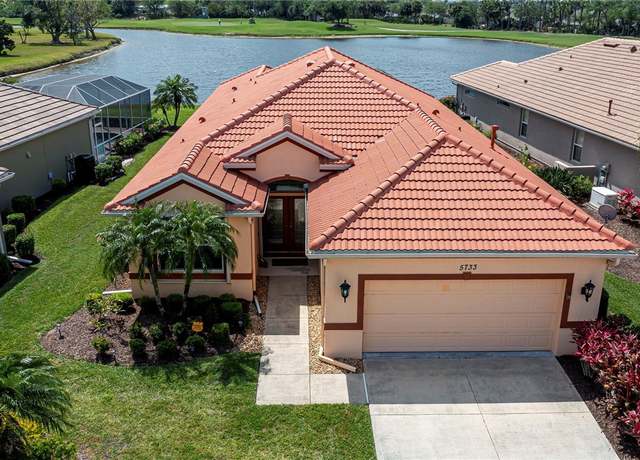 Property at 5733 White Jasmine Way, North Port, FL 34287, 3 beds, 2 baths