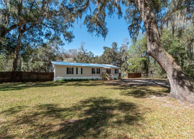 Property at 218 NE 132nd Ter, Gainesville, FL 32641, 4 beds, 2 baths