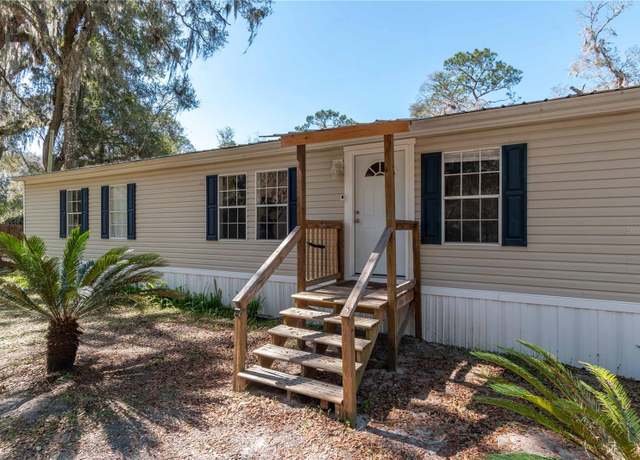 Property at 218 NE 132nd Ter, Gainesville, FL 32641, 4 beds, 2 baths