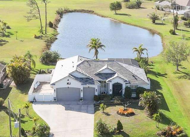 Property at 1417 Carswell St, Port Charlotte, FL 33953, 3 beds, 3 baths