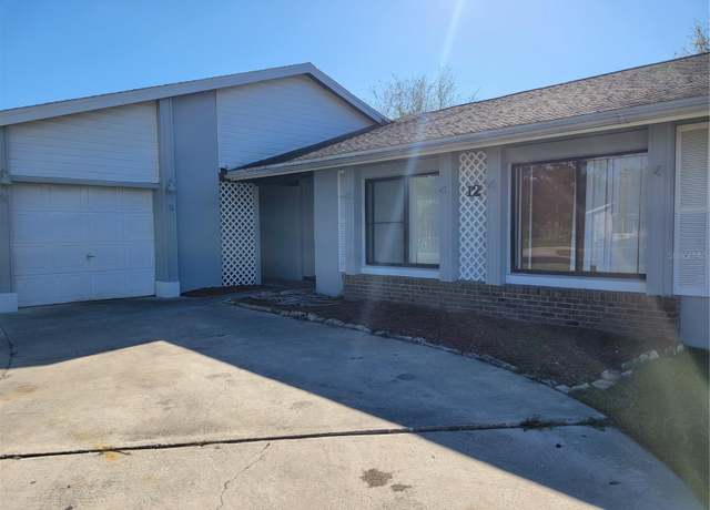 Property at 12 S Flag Ct, Kissimmee, FL 34759, 4 beds, 2 baths