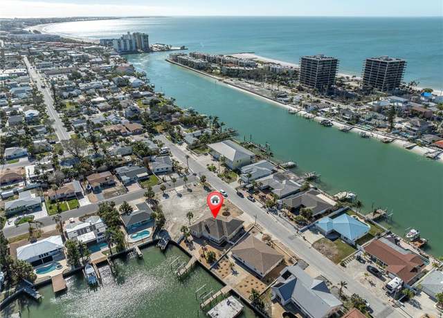 Property at 8021 Coquina Way, St Pete Beach, FL 33706, 3 beds, 3 baths