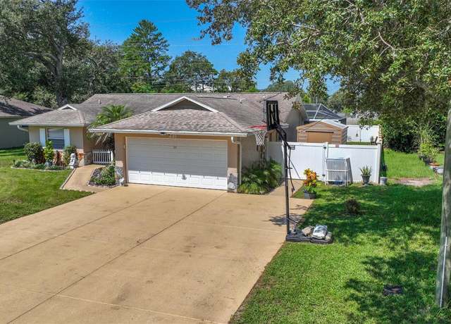 Property at 1649 Larkin Rd, Spring Hill, FL 34608, 4 beds, 2 baths